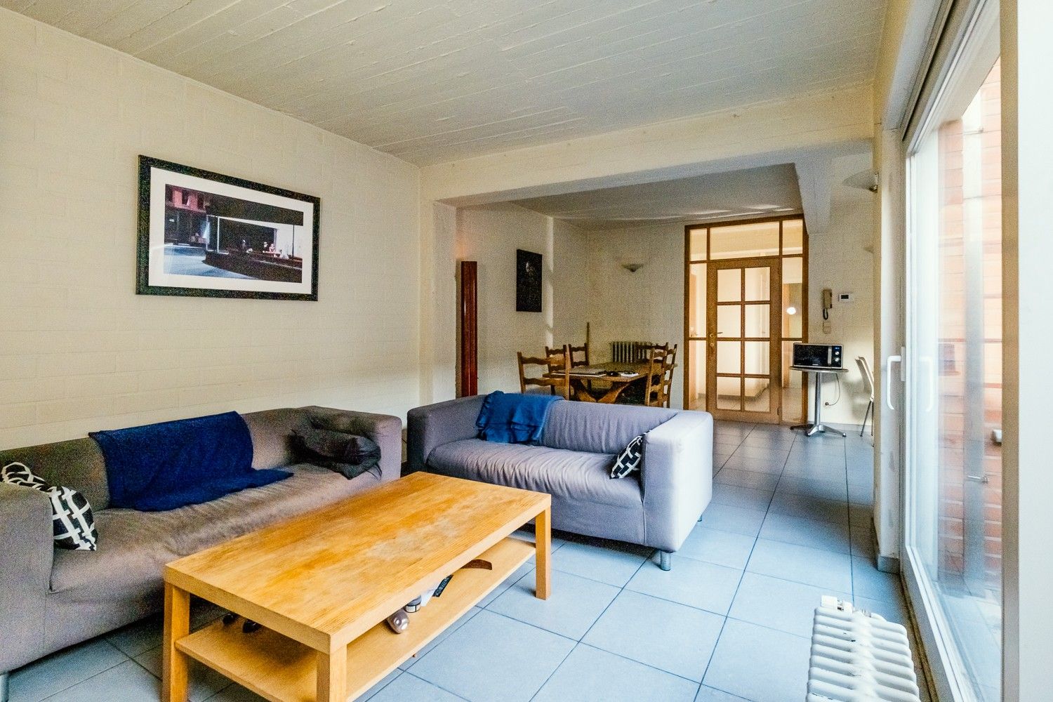 Ruim gelijkvloers appartement met garage! foto 4