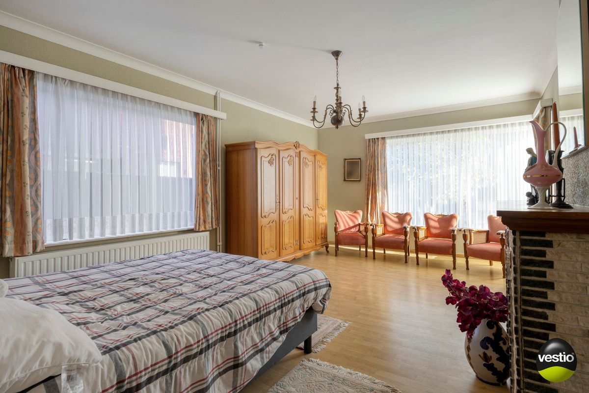 RUSTIG GELEGEN RUIME HALFVRIJSTAANDE WONING MET GROTE TUIN OP 22A49CA TE HOESELT. foto 13