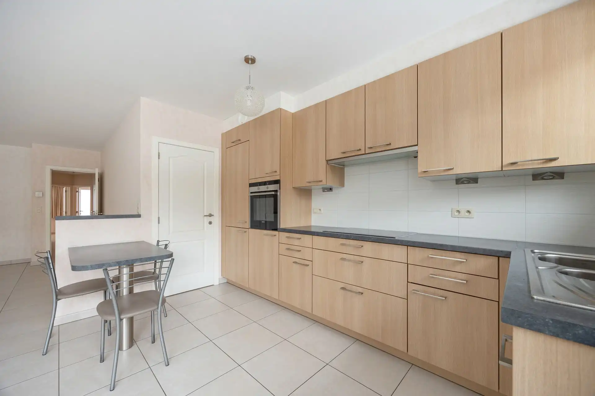 Gelijkvloersappartement met grote tuin & garage foto 7