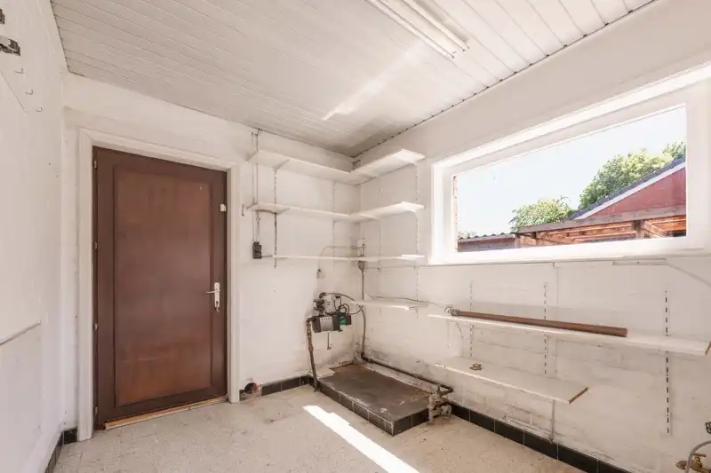 Alleenstaande gelijkvloerse woning met tuin, 3 slaapkamers en inpandige garage centrum wakken TE KOOP foto 17