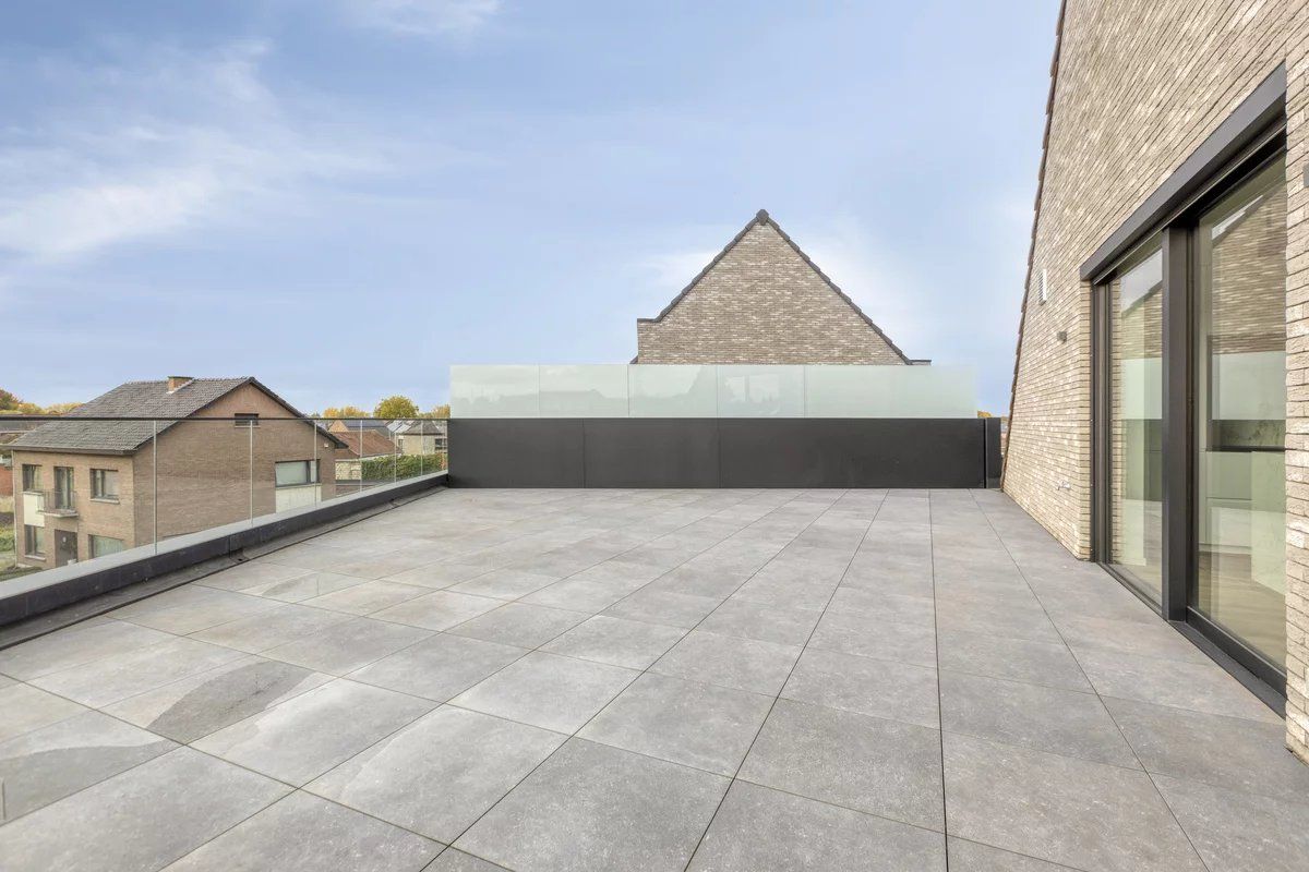 EXCLUSIEF EN KWALITATIEF NIEUWBOUWAPPARTEMENT VAN 163 M² MET 3 SLPK'S, 2 BADK'S EN RIANTE TERRASSEN IN MUNSTERBILZEN foto 14