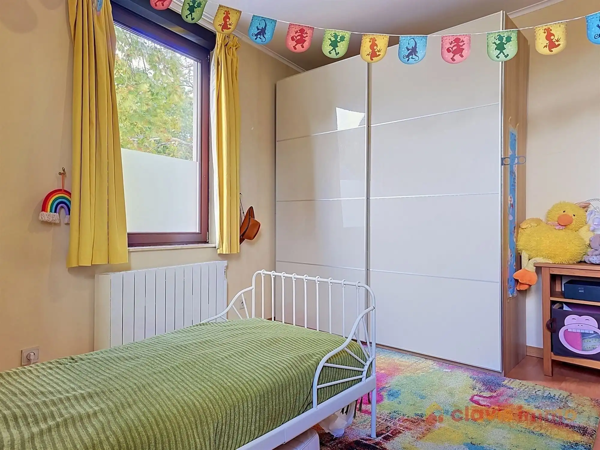 Aangename 3-gevel woning met tuin foto 17