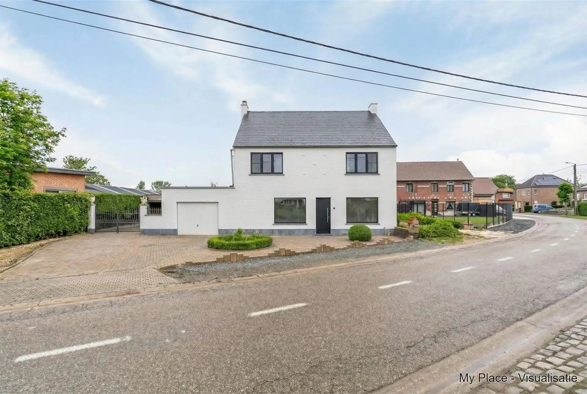 Renovatiewoning met garage en tuin. foto 26