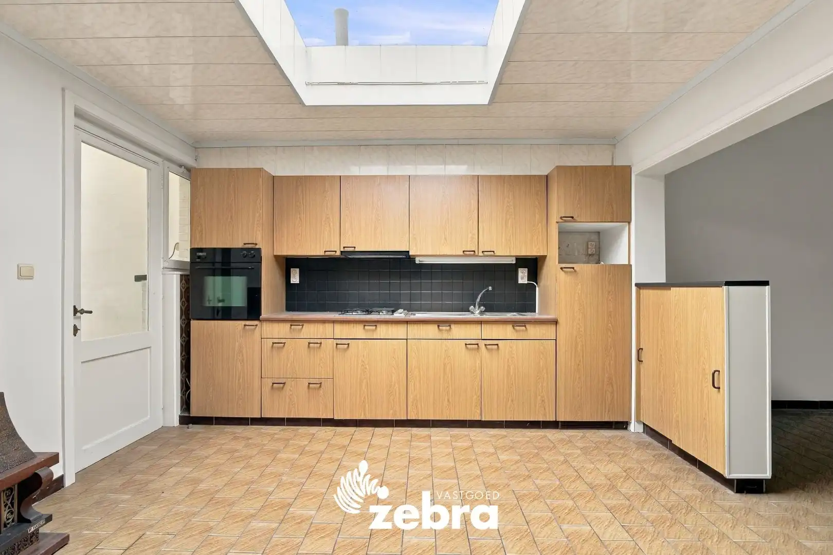 Te renoveren woning met uitweg te Roeselare! foto 6