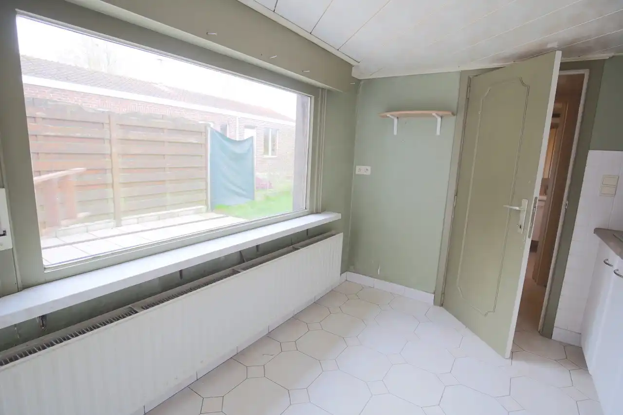 Rijwoning met terras en tuin foto 5