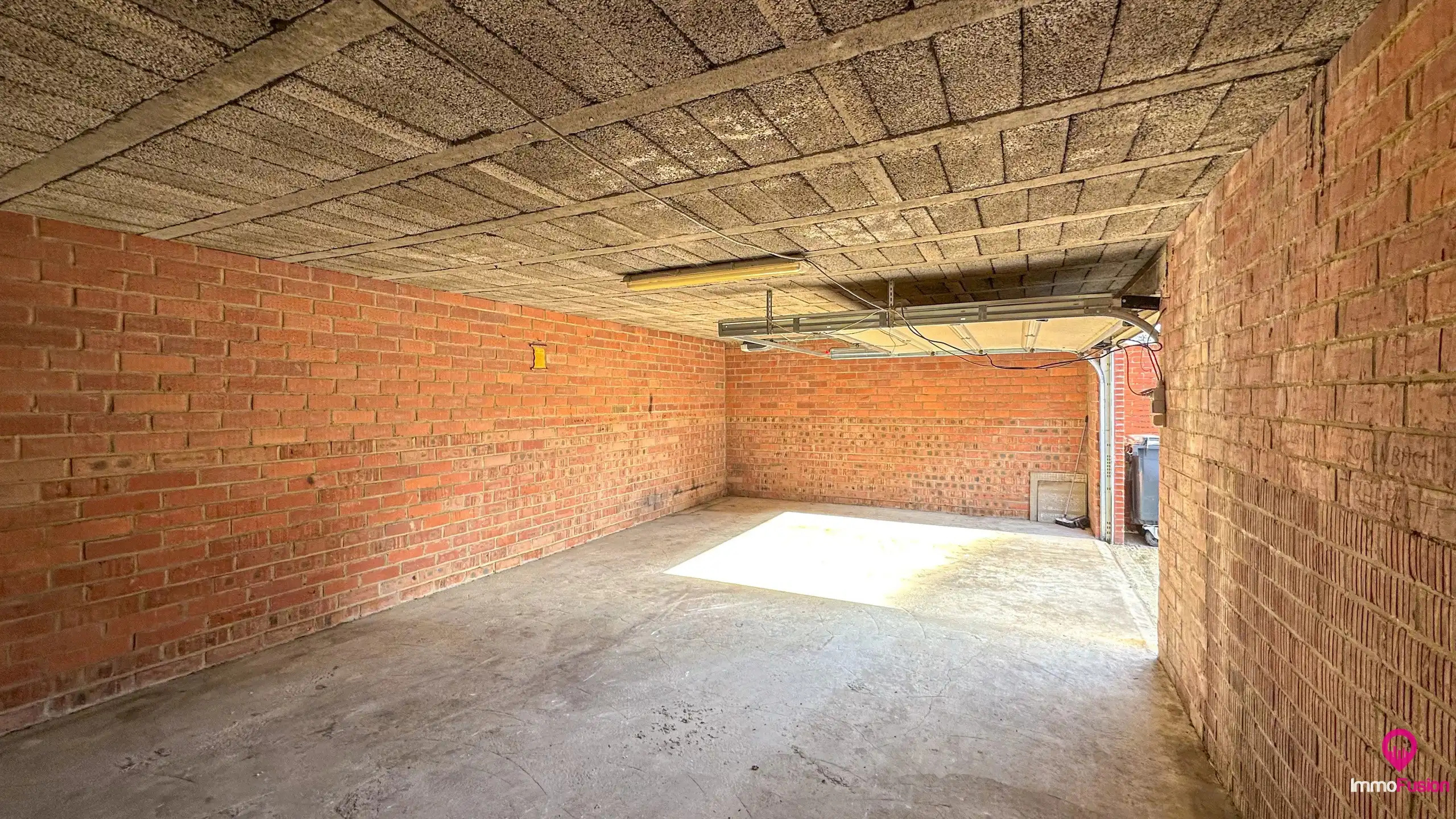 Ruim handelspand met garage in het centrum van Beringen! foto 19