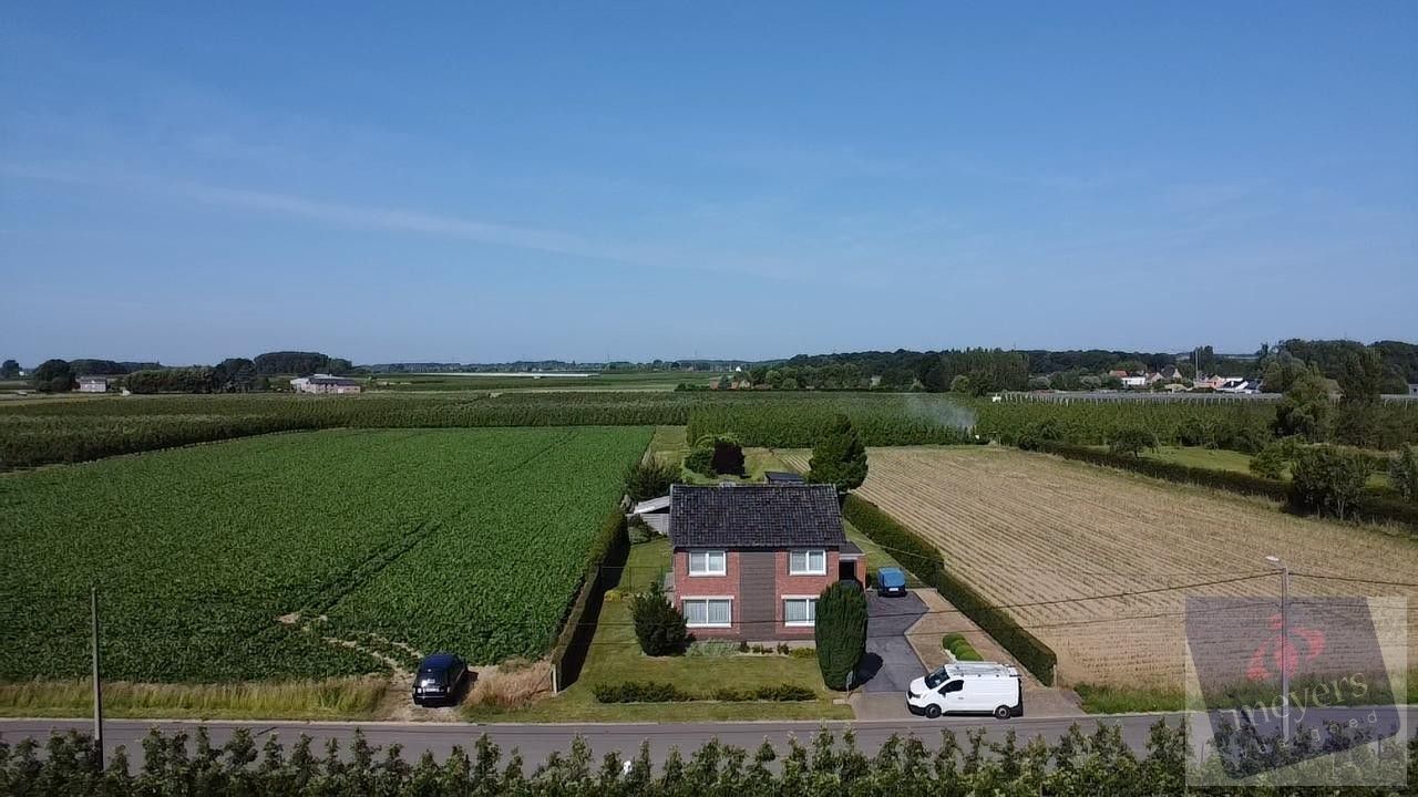 Ruime gezinswoning op uitzonderlijk perceel van 24a09ca in hartje Alken foto 2
