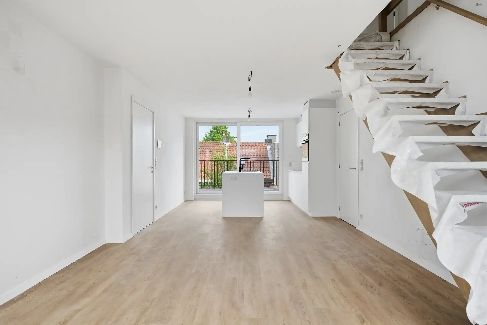 Ruim duplex appartement met 3 slaapkamers en 2 badkamers foto 3