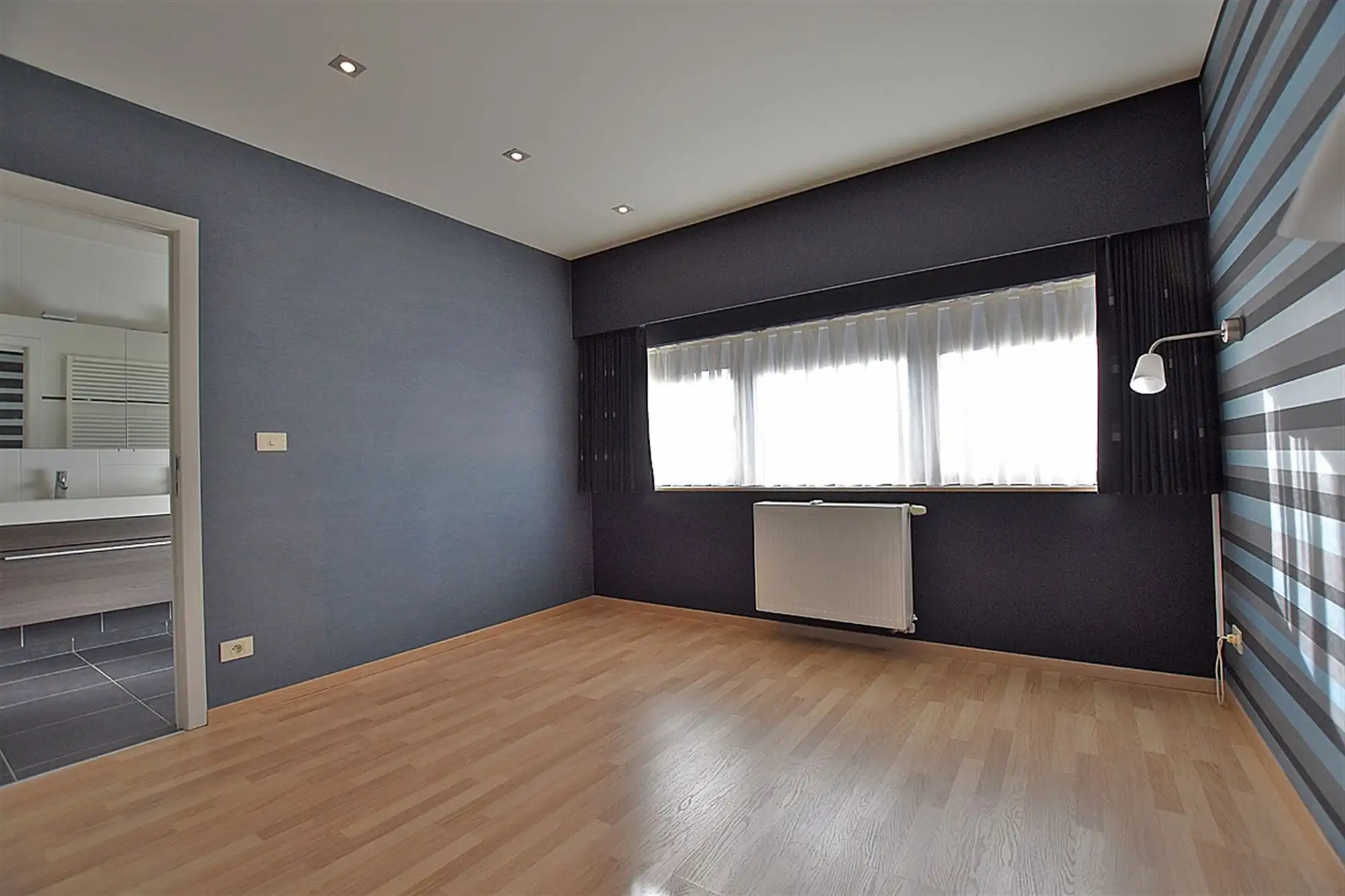 DORPSWONING met 2 slpks, garage/berging & tuin met terras foto 11