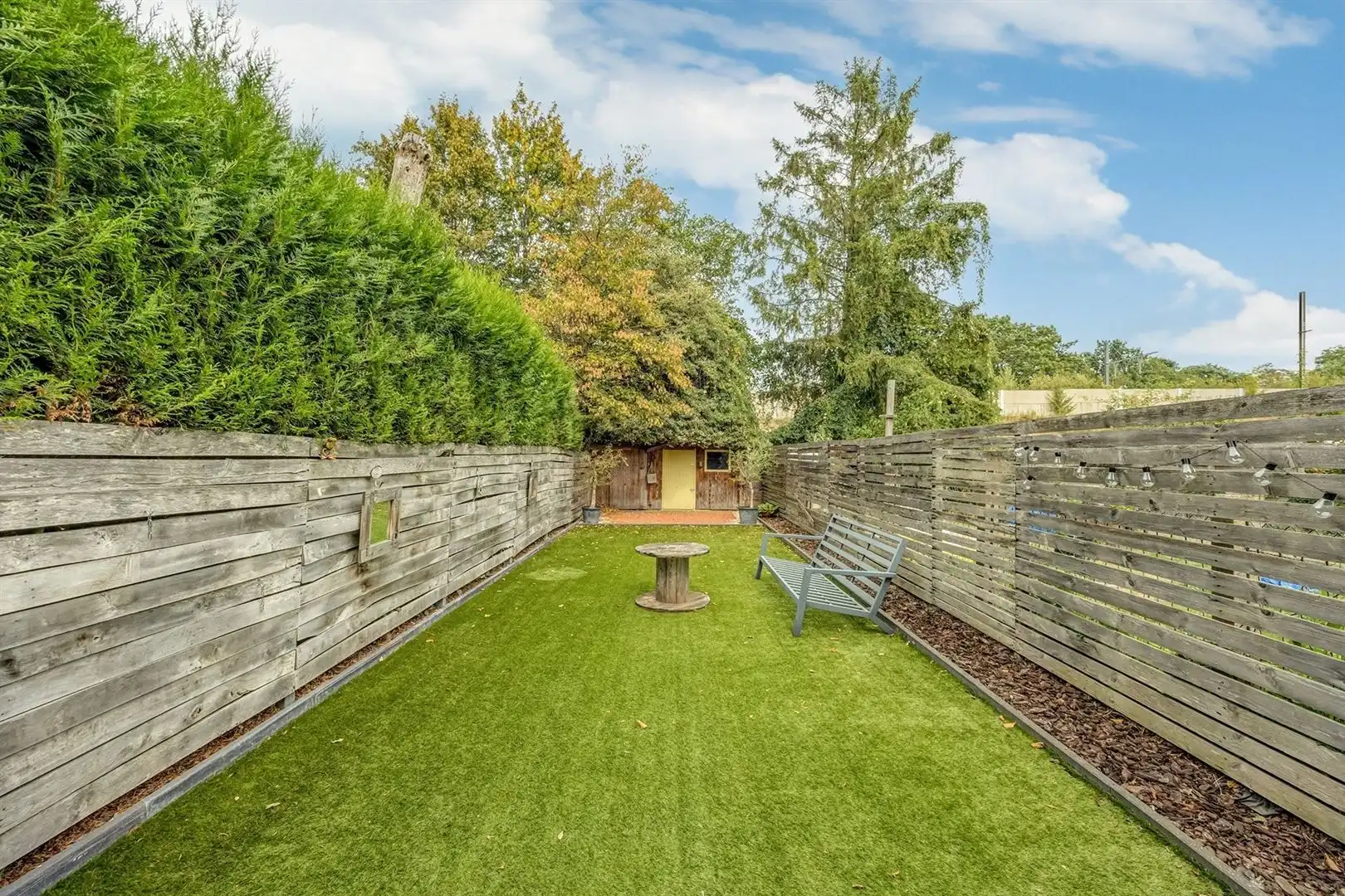Hedendaags 2-slaapkamerappartement met tuin, garage en praktijkruimte  foto 16