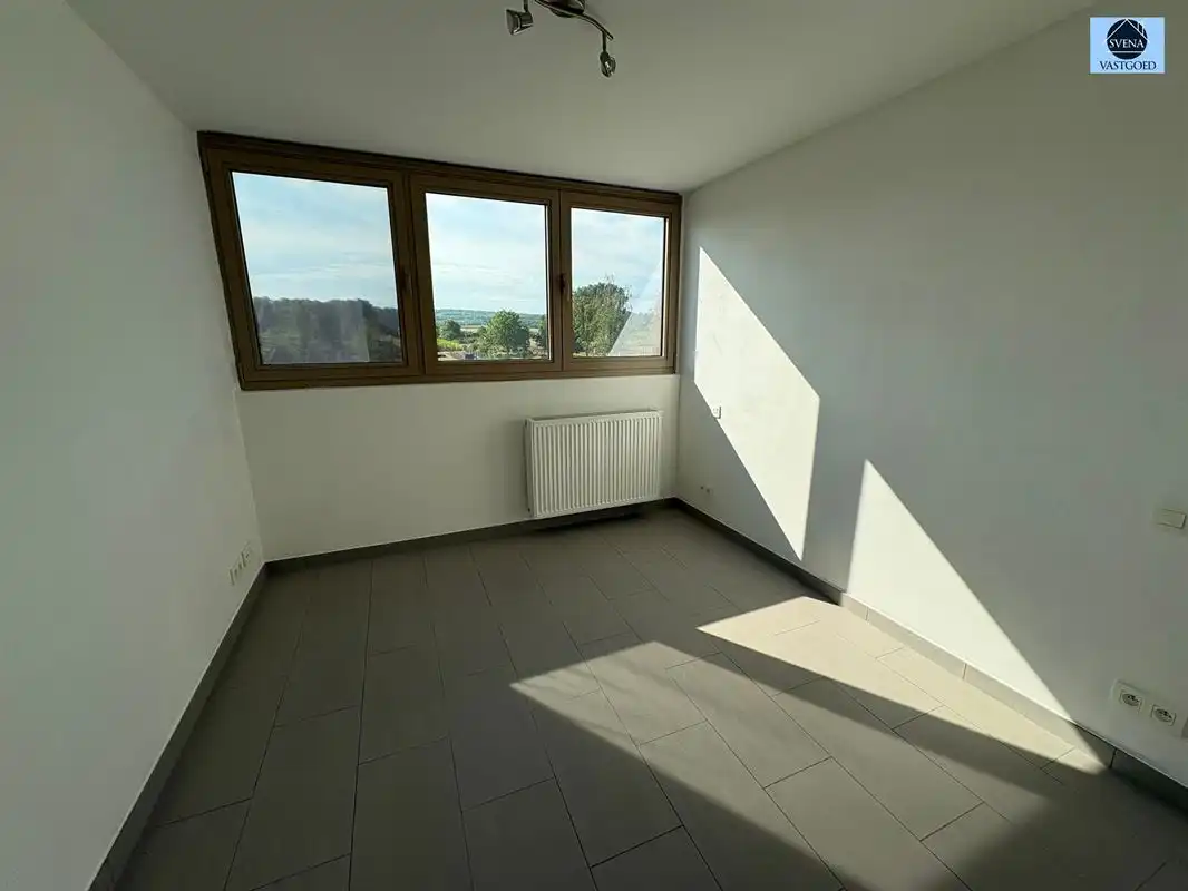 ENERGIEZUINIGE INSTAPKLARE WONING MET 2 SLAAPKAMERS, GARAGE EN TUIN foto 10