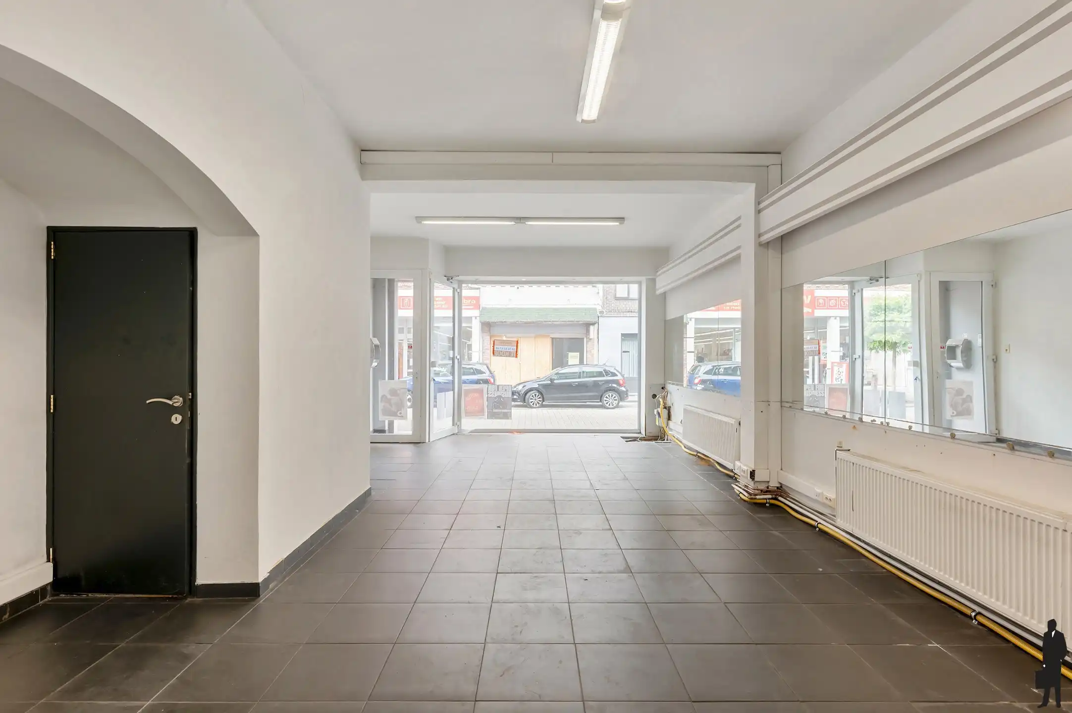 Handelsgelijkvloers met gerenoveerde triplex in het centrum! foto 5