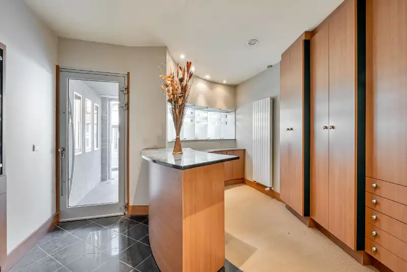 Wonen en werken in het hart van Gavere – energiezuinige opbrengsteigendom foto {{pictureIndex}}