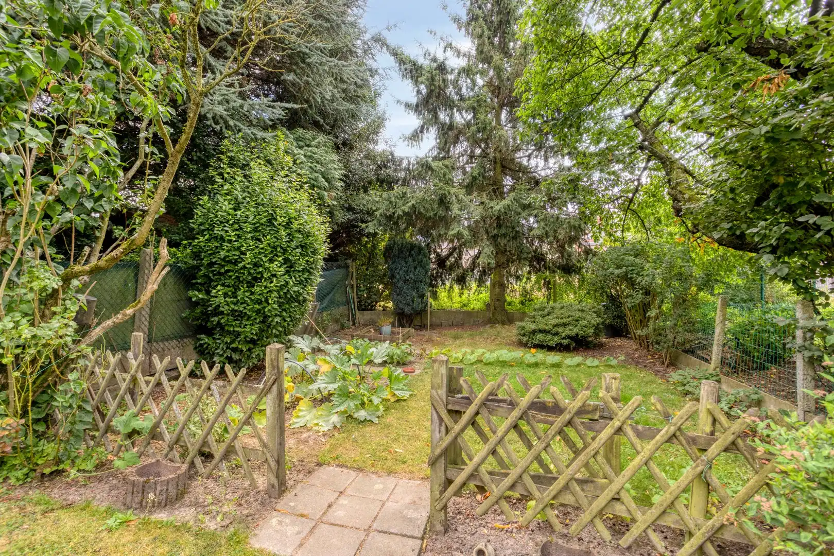 Opbrengsteigendom met tuin en 2 verhuurde appartementen in Wemmel foto 23