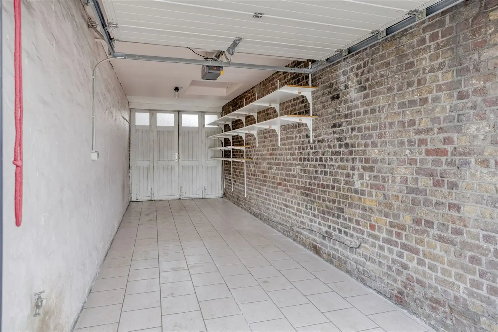 Te renoveren woning gelegen aan het plein in Kaprijke ! foto 17