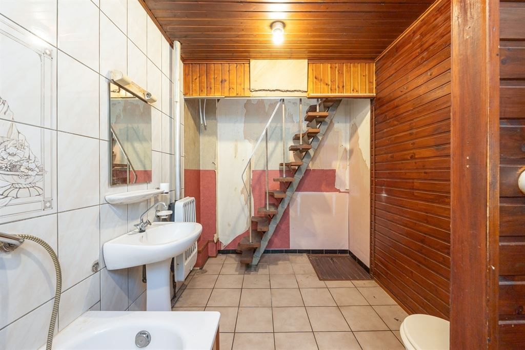 Te renoveren woning in rustige, gegeerde wijk foto 12