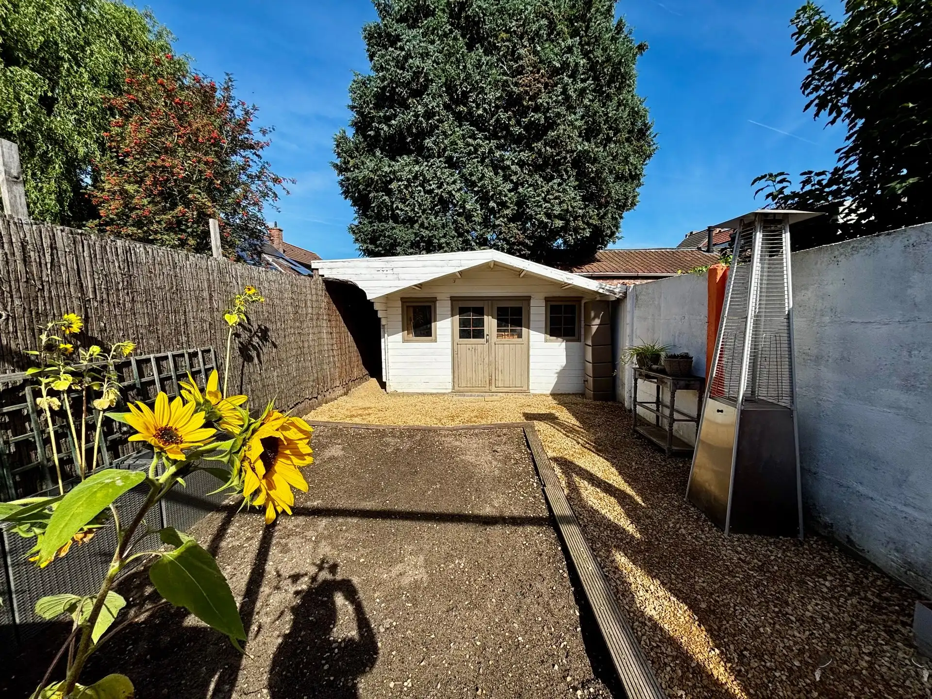 Rijwoning met 3 slaapkamers & tuin foto 16
