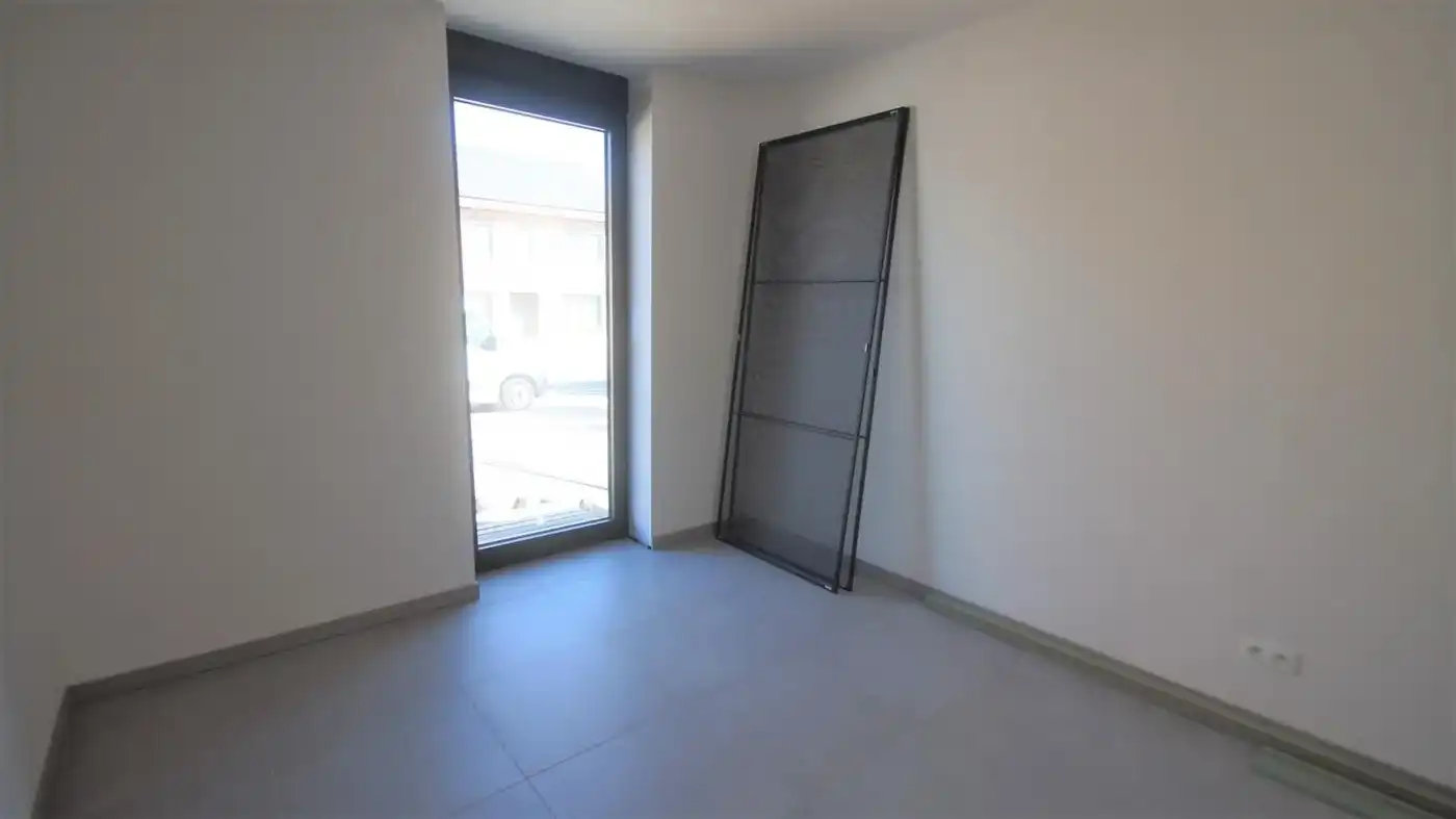 Nieuwbouwapp. met 2 slpks, autostaanplaats, ruim terras en tuintje foto 9