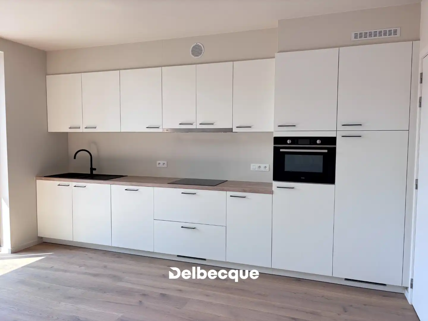Lichtrijk nieuwbouwappartement met ruim terras en 2 autostaanplaatsen foto 3