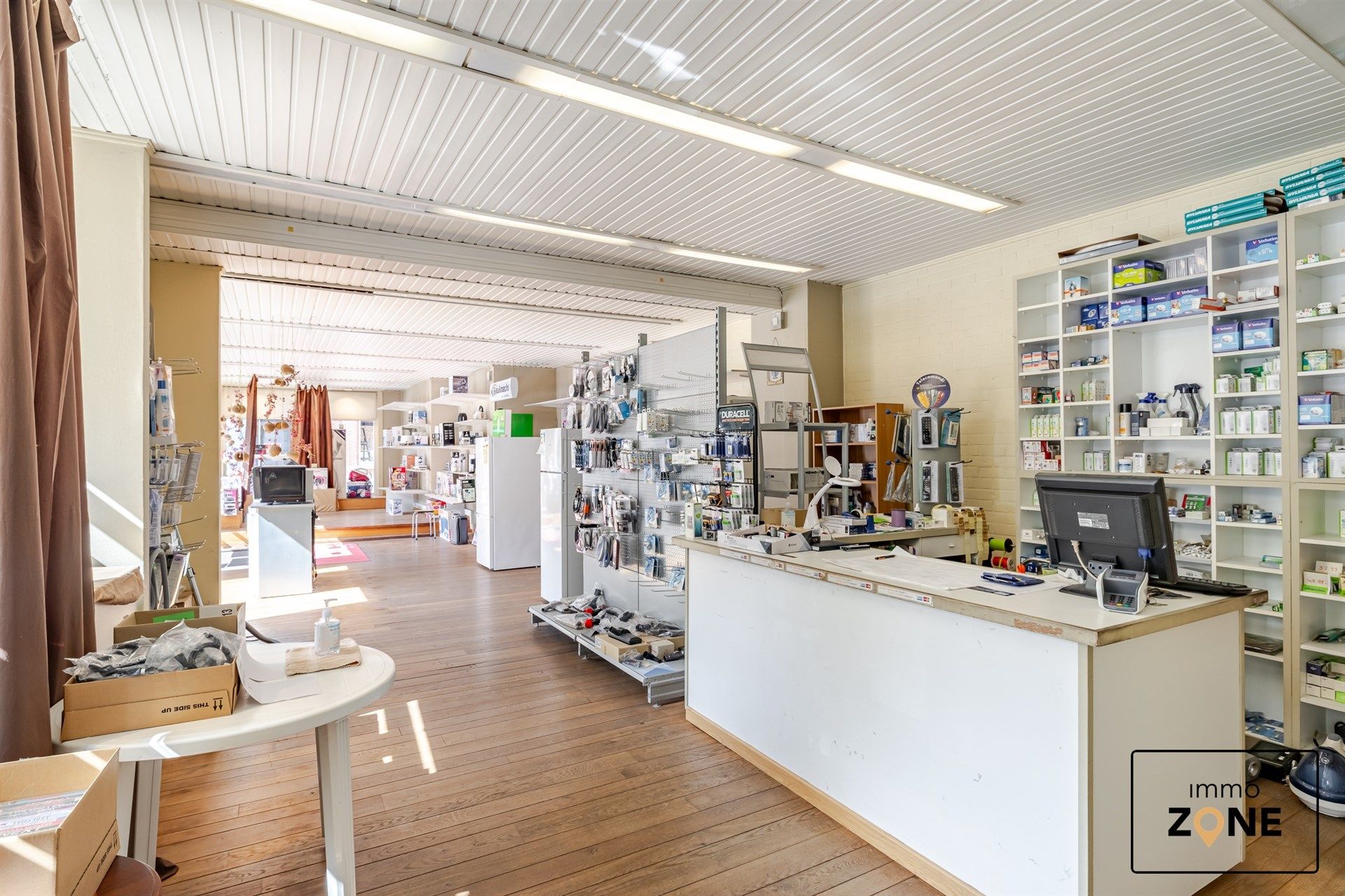 Handelspand met appartement te koop in het centrum van Hamme foto 4