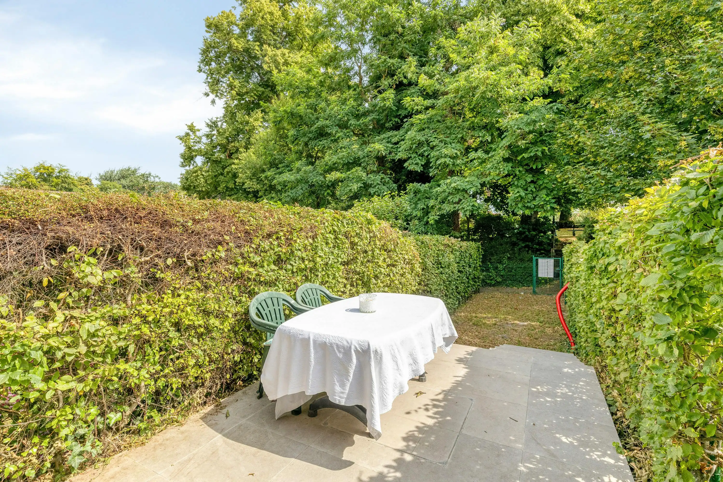 Vernieuwde woning met gezellige tuin langs de Brugse Vesten foto 3