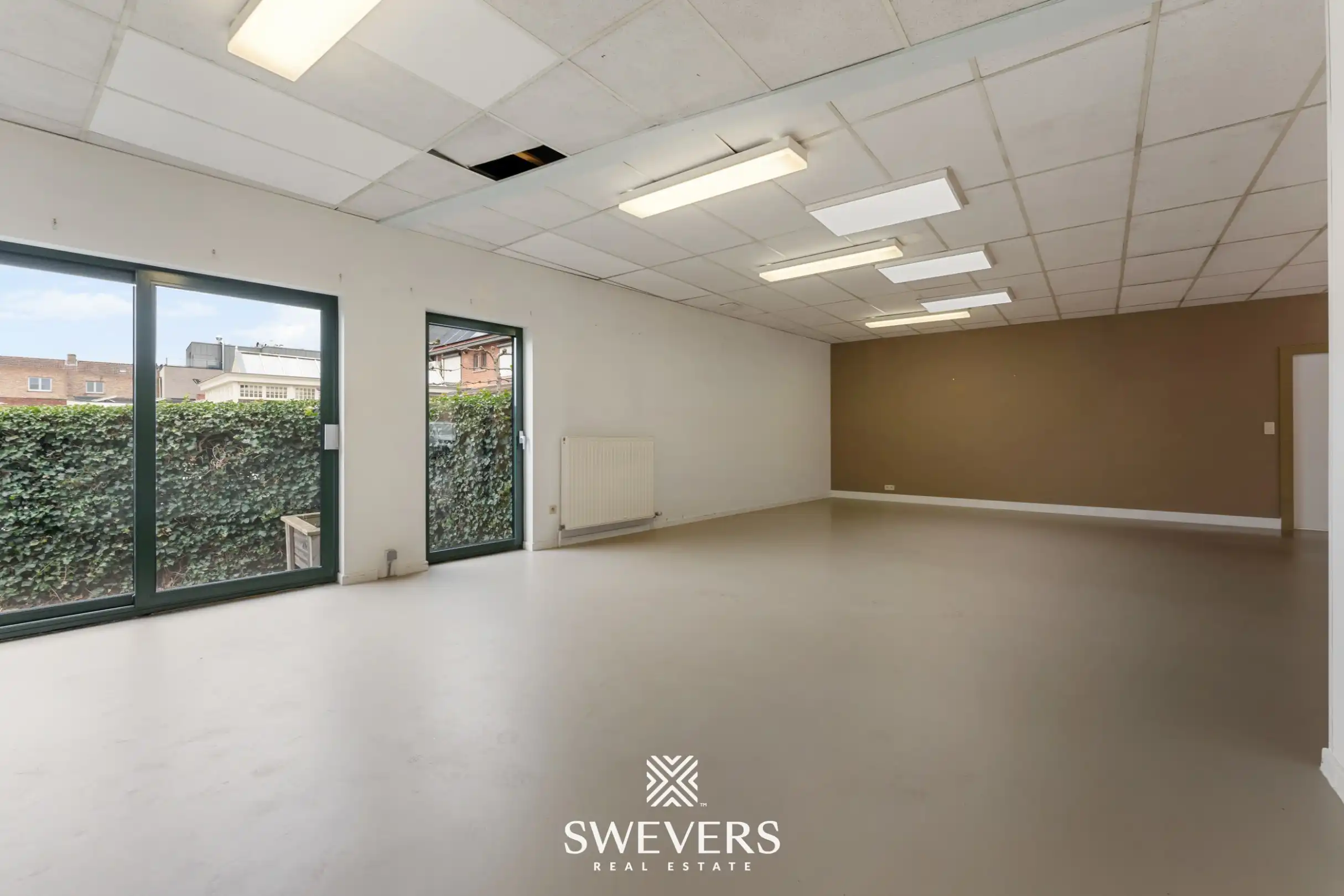 Commerciële opportuniteit met veel visibiliteit en ruimte in het centrum van Beringen foto 14