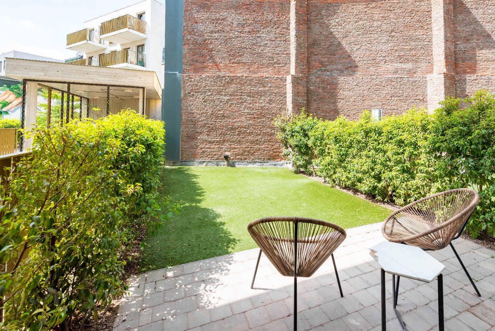 Gelijkvloers appartement met gezellige tuin foto {{pictureIndex}}