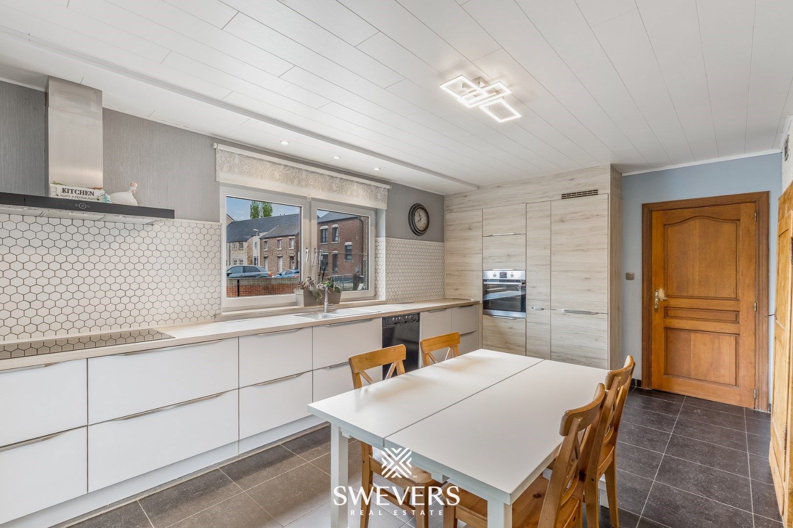 Gezellige woning met veranda, garage & zonnige tuin foto 8