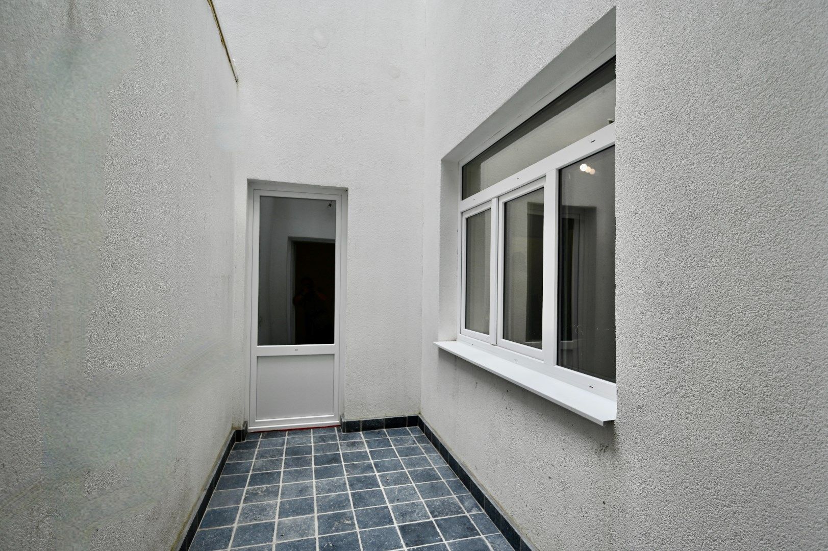 KARAKTERVOL GELIJKVLOERS APPARTEMENT MET STADSTERRASJE foto 9