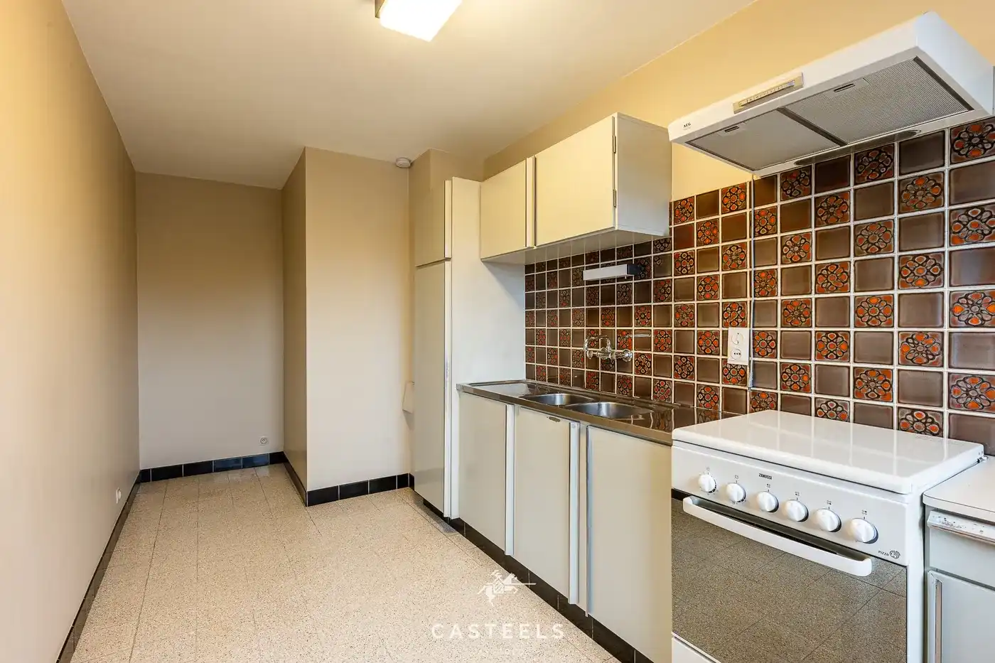 Ruim, te renoveren EPC B appartement met twee slpkmrs te Gent foto 5