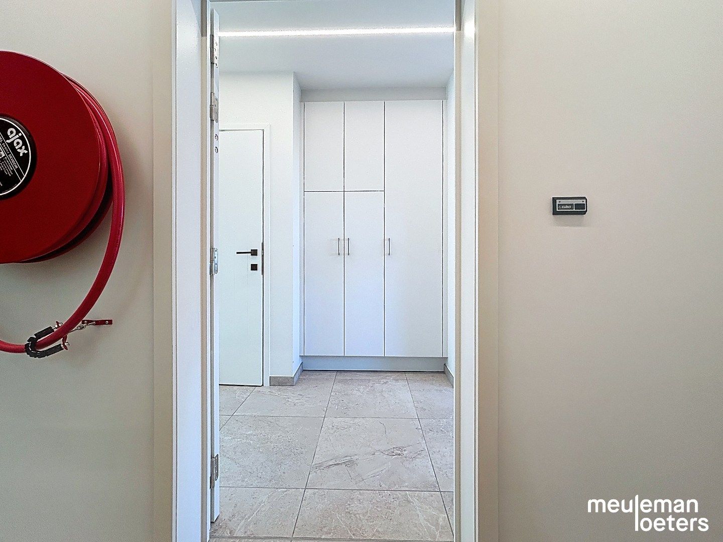 Ruim nieuwbouwappartement met garage foto 16