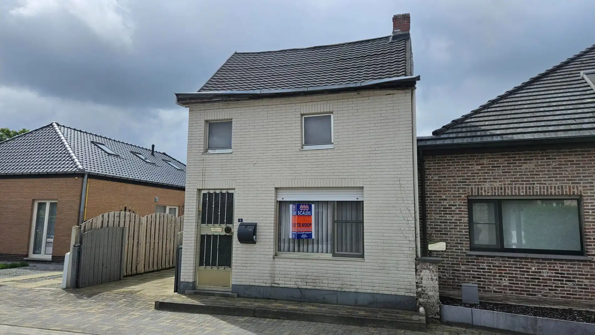 Renovatiewoning met 2 slk, garage en tuin  foto 3