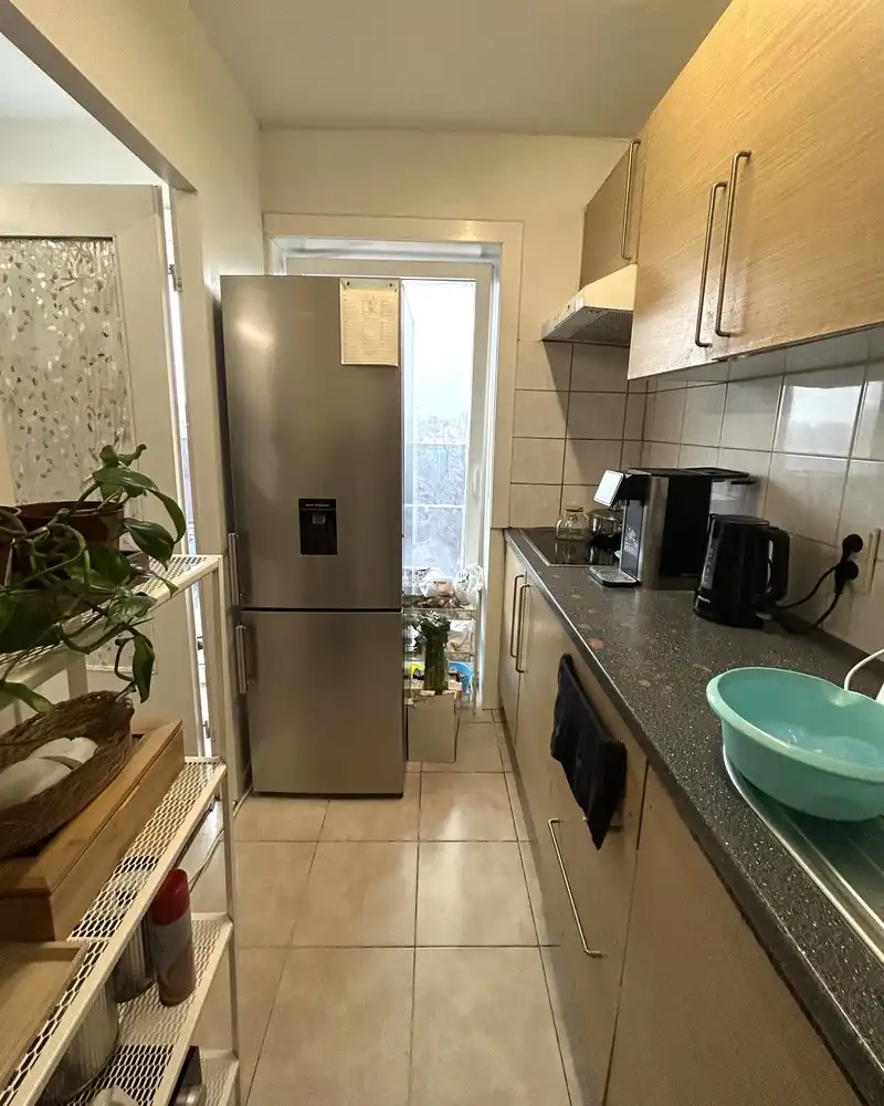 Op te frissen 1-slaapkamerappartement met autostaanplaats en kelder foto 5