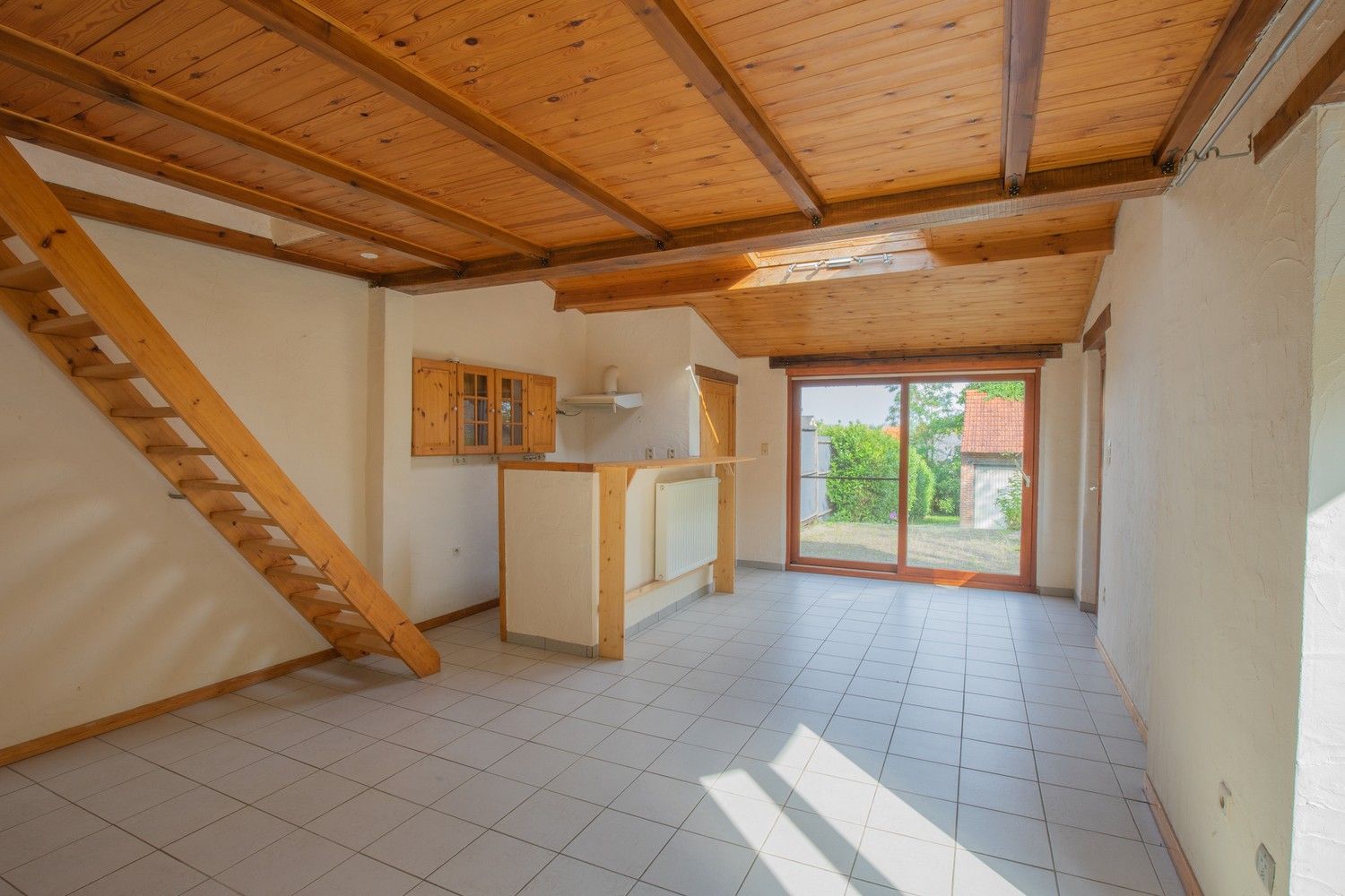 Charmante halfopen woning met 3 slaapkamers, ruime garage en gunstige ligging in Holsbeek foto 4