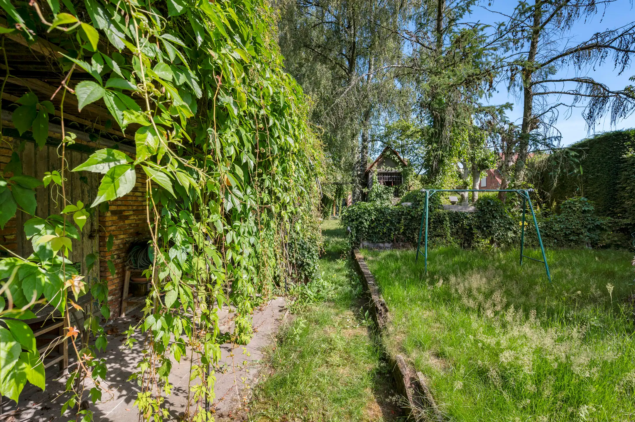 Karaktervolle woning op een toplocatie met diepe tuin en garage in een doodlopende straat nabij het centrum van Heide foto 32