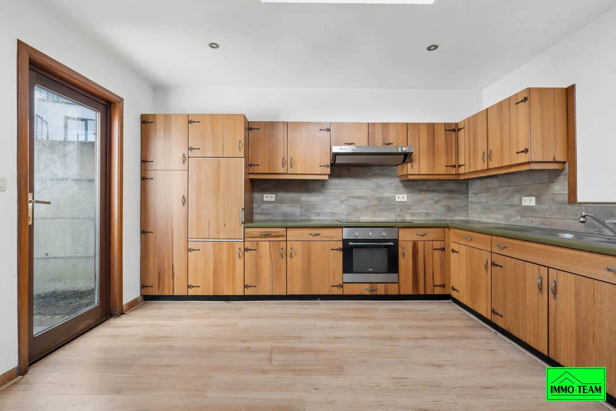 Te renoveren woning in rustige straat in Asse foto 5