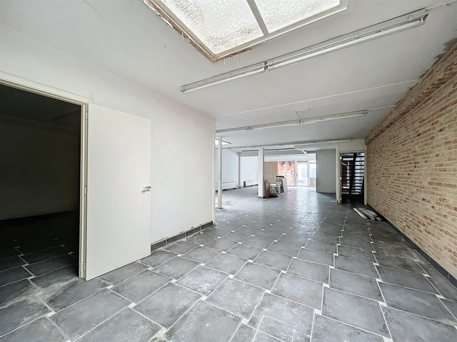 Handelspand met 2 appartementen op perceel van 491 m² NETTORENDEMENT 5% foto 13