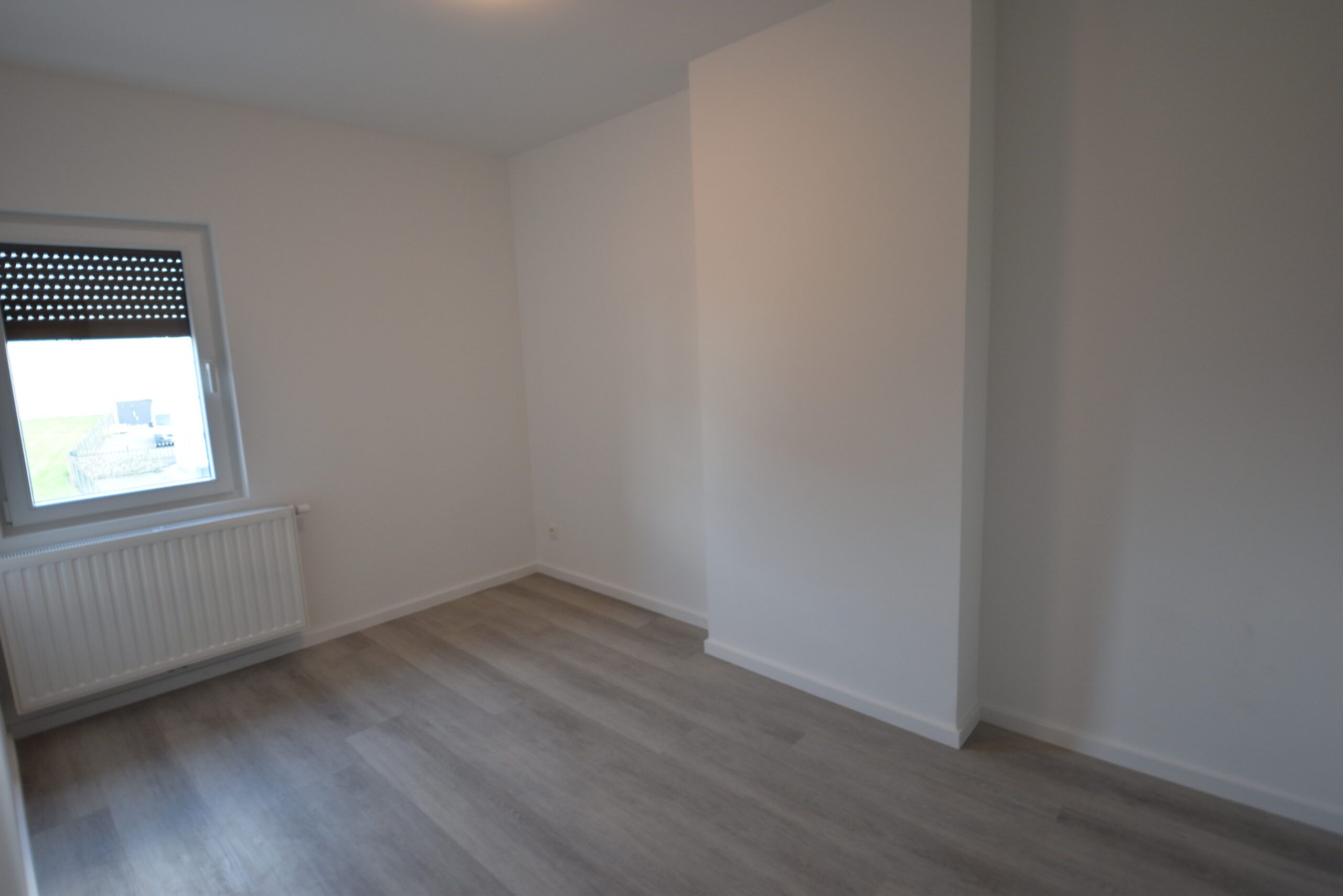 Instapklare halfopen woning met grote tuin en werkruimte. foto 14