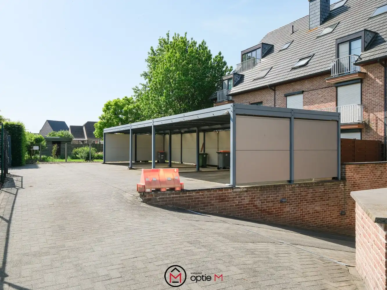 Gelijkvloers appartement te koop in Bilzen – Ruim wonen met terras, carport en kelderberging foto 17