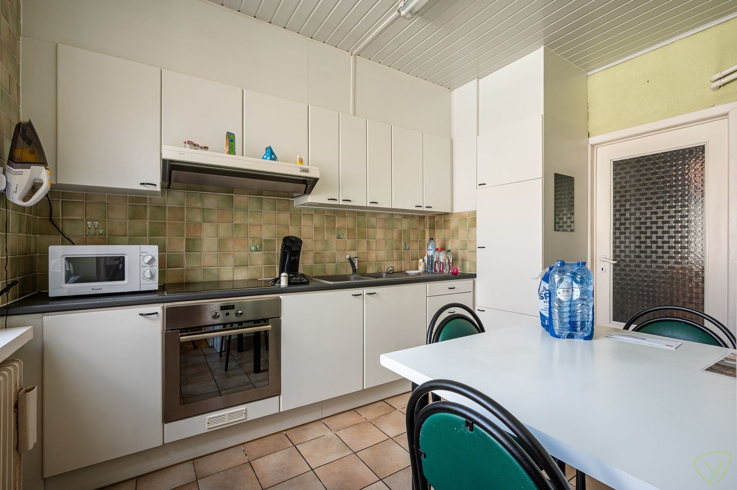 Woning met winkelruimte te koop in het centrum van Ursel foto 4