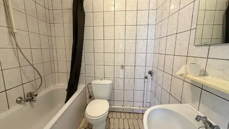 Opbrengsteigendom met 7 appartementen + ruime garage-magazijn 150m² foto 8