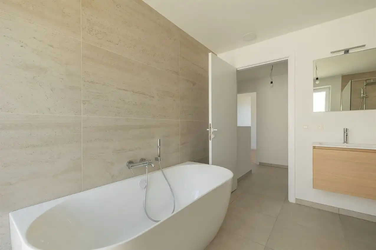 Instapklare nieuwbouwwoning met 4 slaapkamers, 2 badkamers en E-peil 9 foto 28