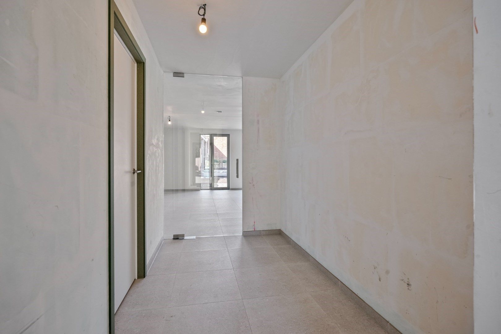 Luxueus gelijkvloers 3-slaapkamerappartement met tuin en terras! 6% BTW mogelijk  foto 8