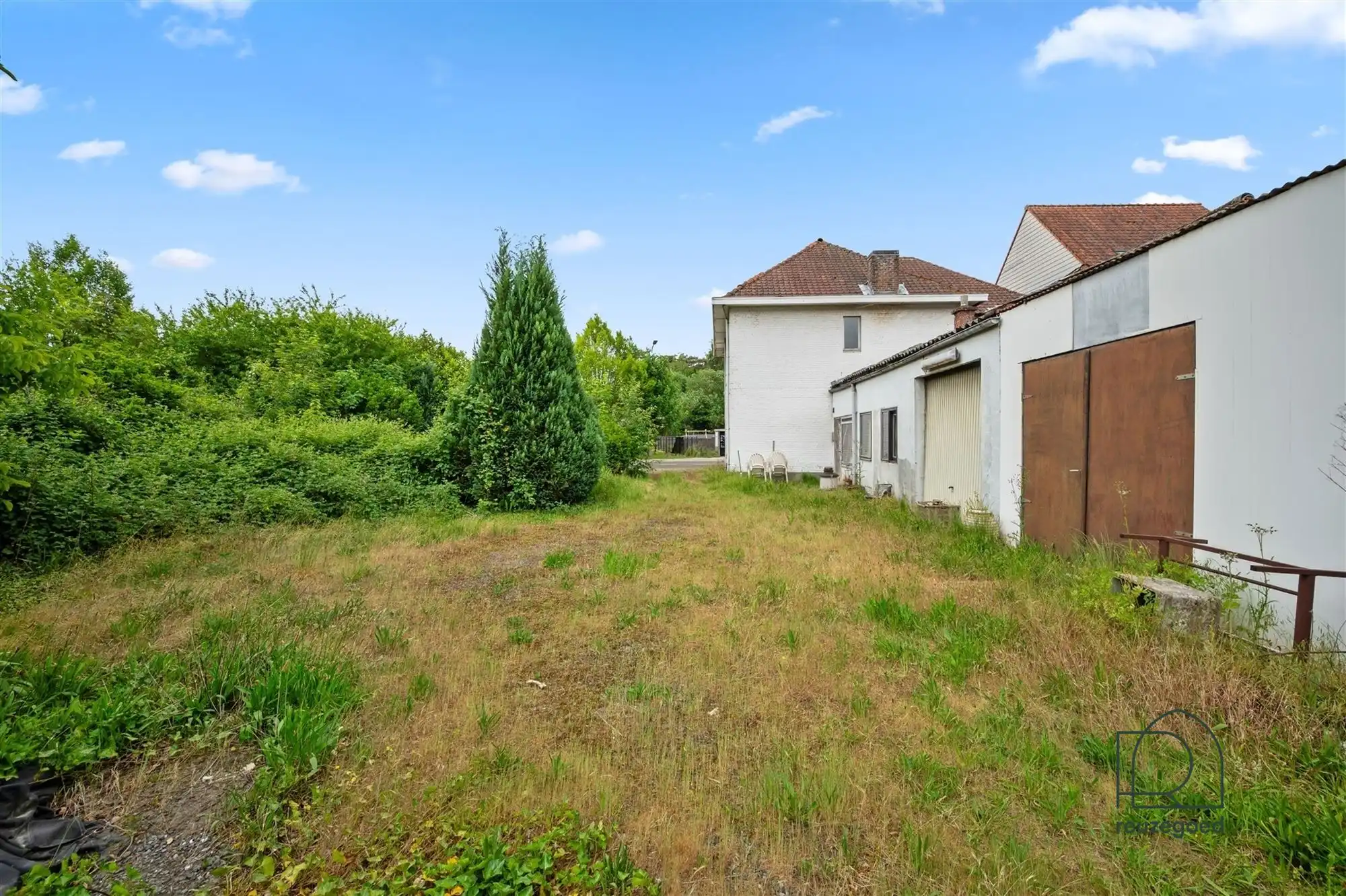 Te renoveren huis (tweewoonst)  met mogelijkheid tot 2 bouwgronden foto 27