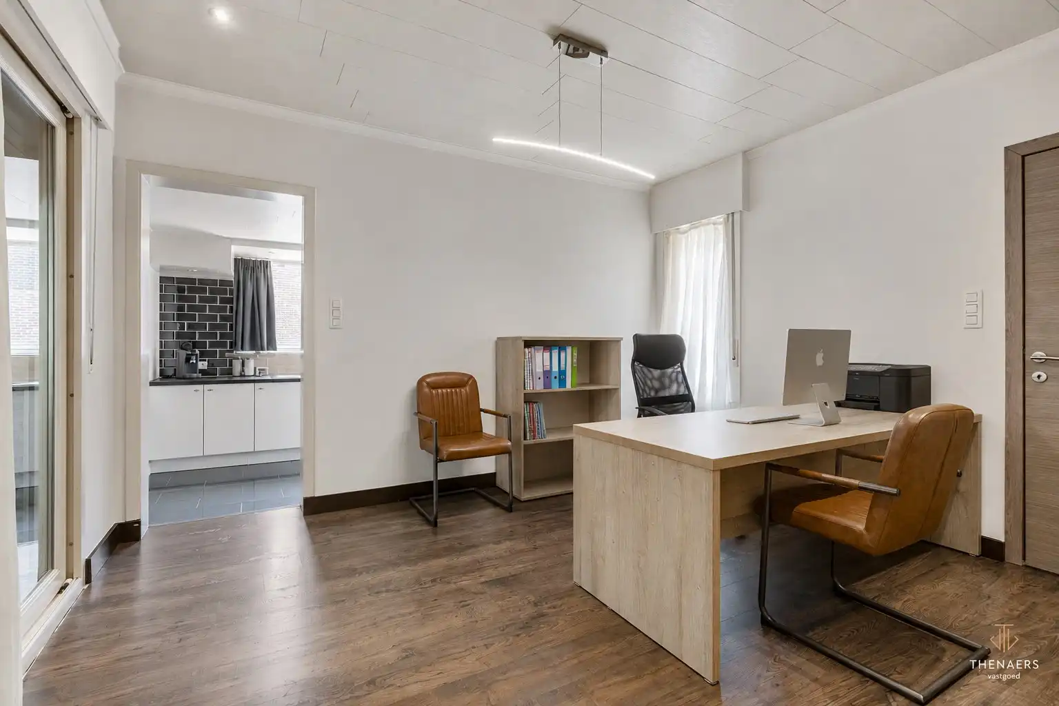 Gezinswoning met drie slaapkamers, garage en aangename buitenruimtes in het landelijke Opheers. foto 11