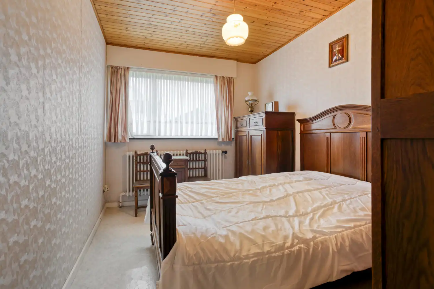 Verzorgde bungalow op topligging met 2 slaapkamers, inpandige garage en zonnige tuin foto 11