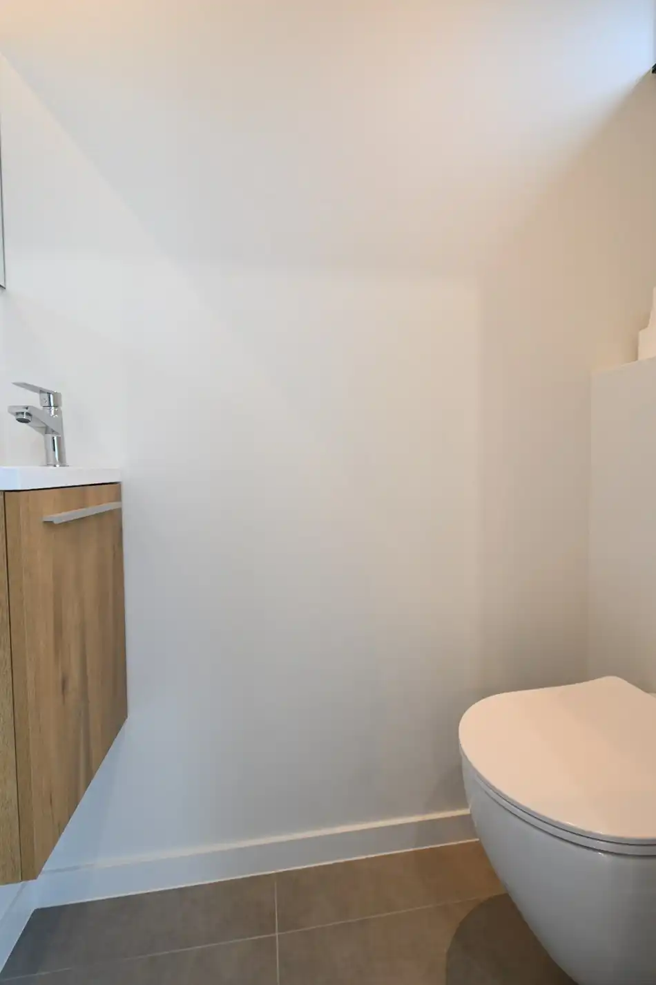 Zorgvuldig gerenoveerde vrijstaande woning met veranda en leuke tuin op 5a24ca te Munsterbilzen foto 5