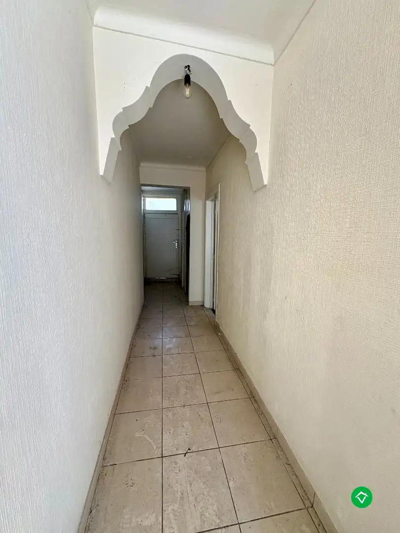 Woning met veel potentieel op een ruim perceel in het centrum van Koekelare foto 12