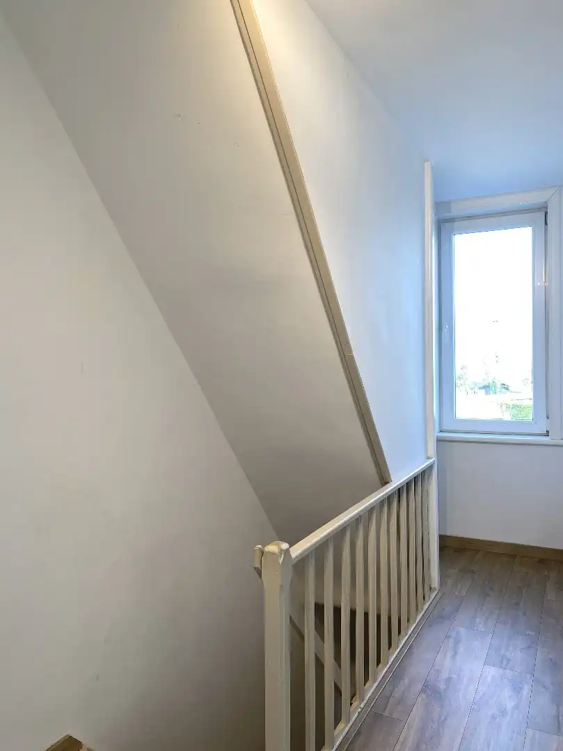 RIJWONING MET 3 SLAAPKAMERS EN TUIN NABIJ HET CENTRUM foto 8