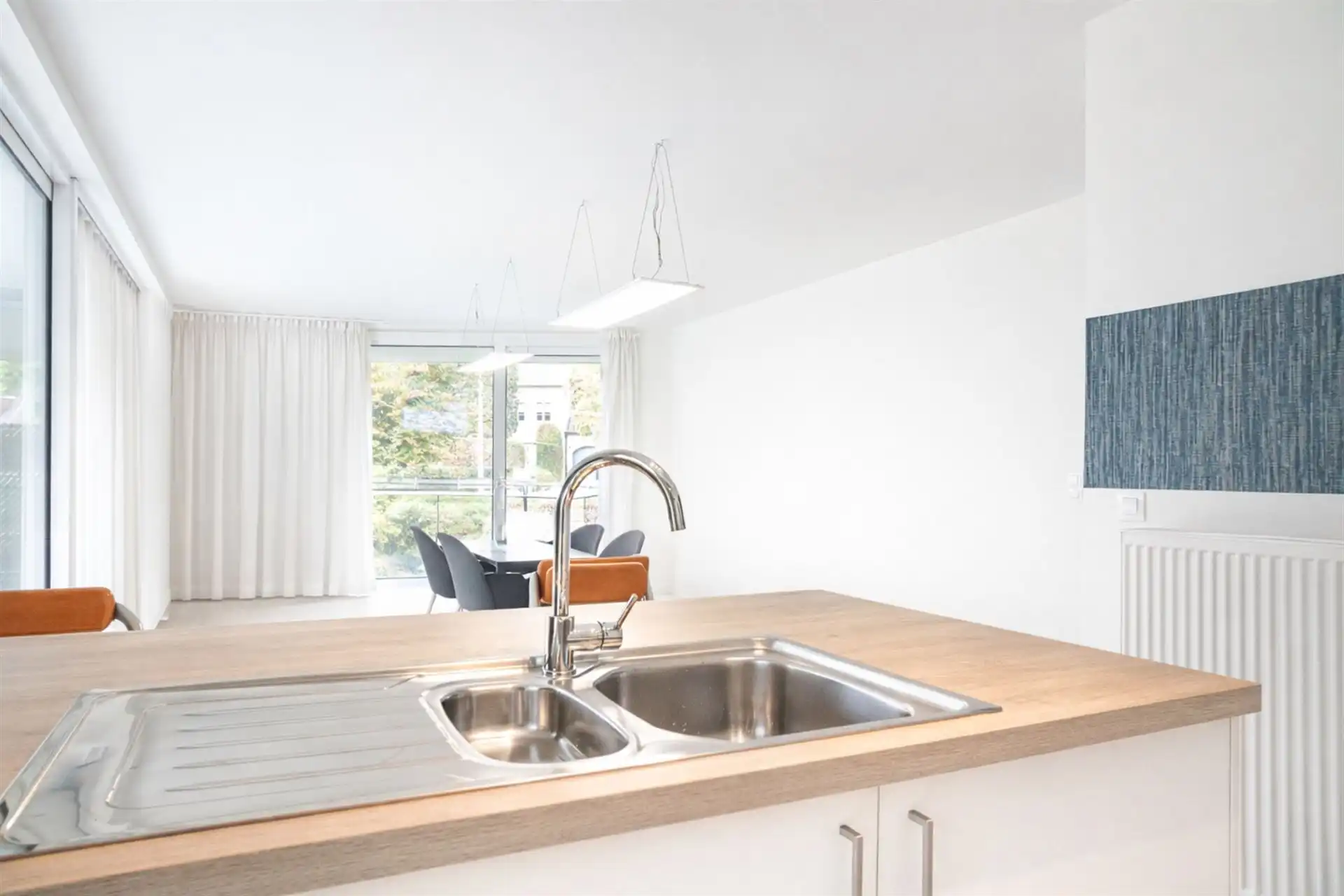 Lichtrijk gelijkvloers appartement met terras en tuinzicht foto 11